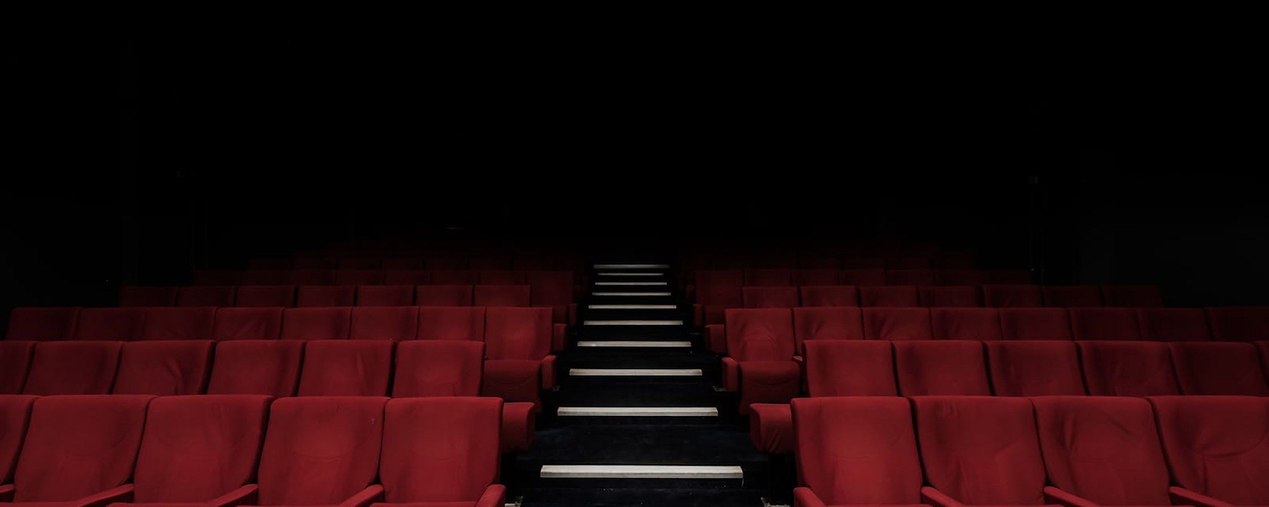Audience watching translated audiovisual content in a cinema
