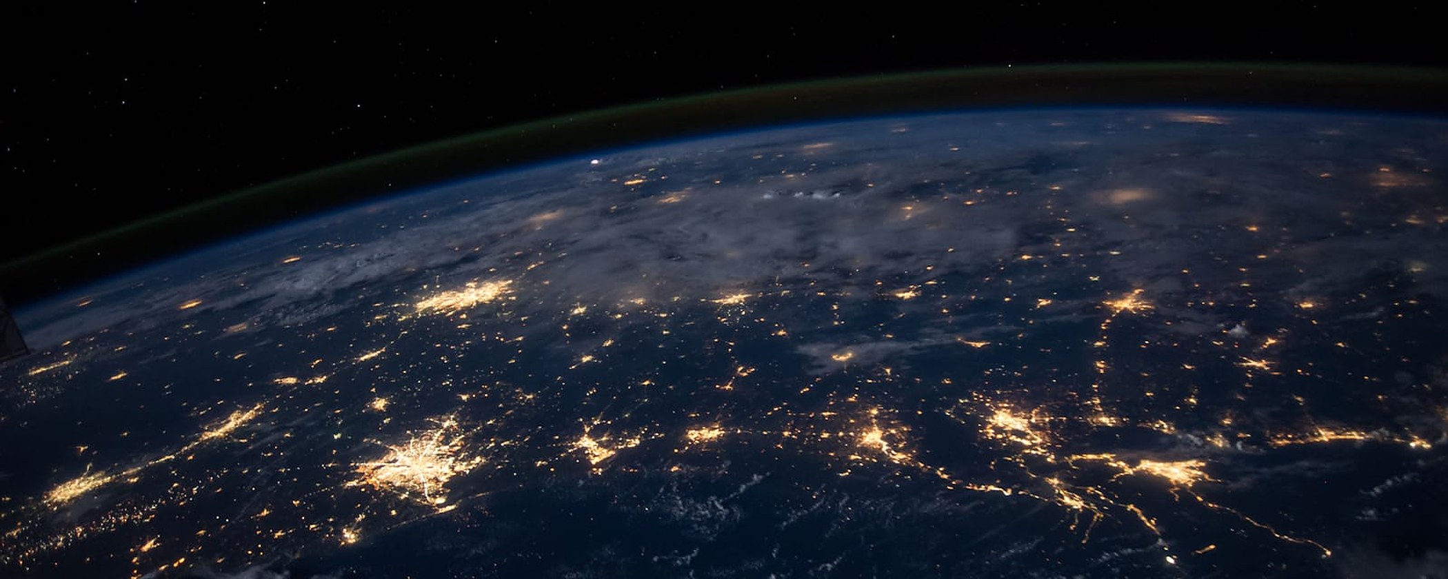 Global network of city lights representing website localization for new markets